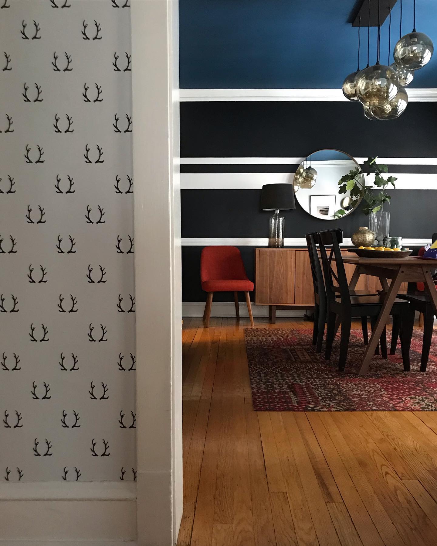 Photo of paint color bm-black-satin in a Living Room by @this_foursquare_life