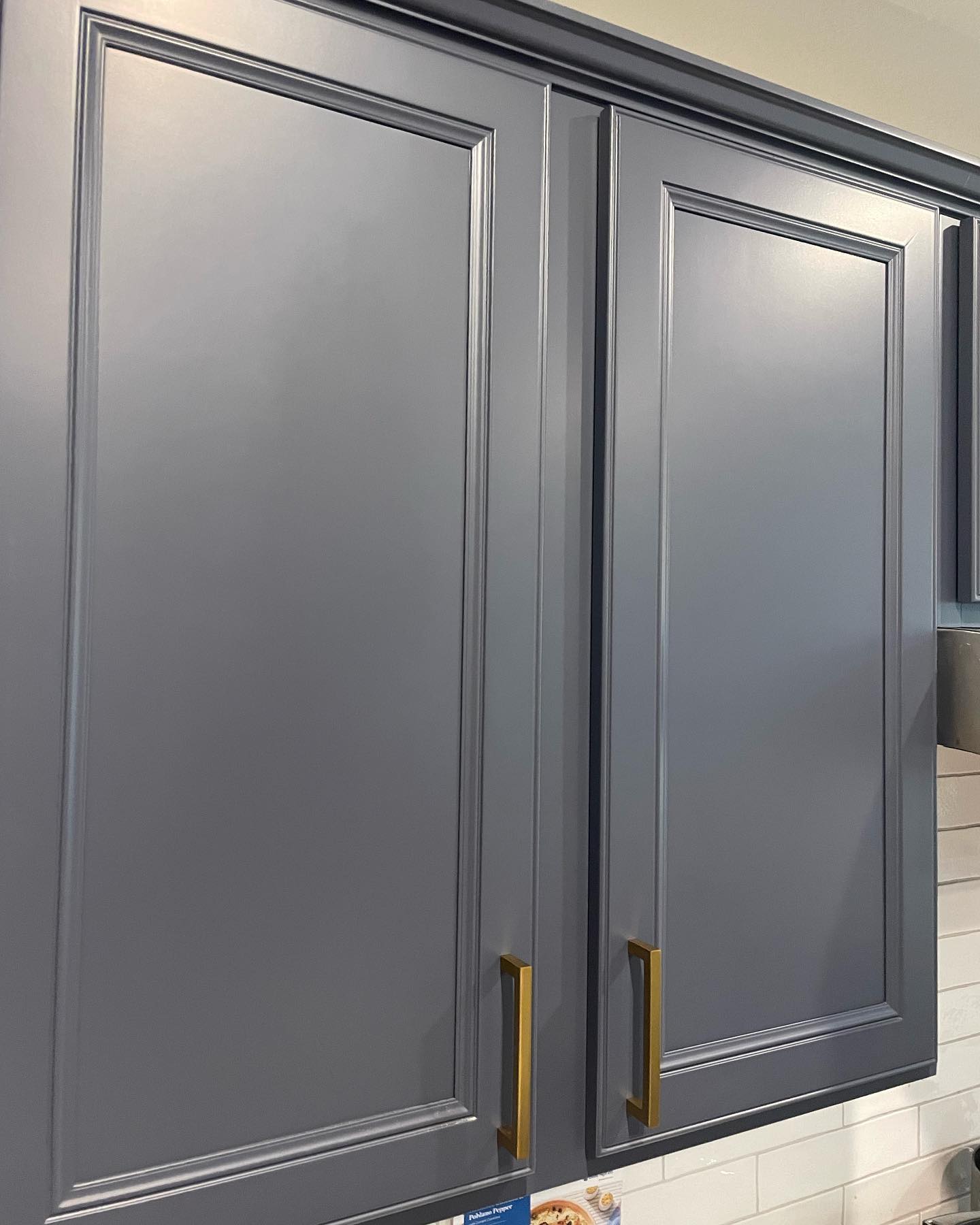 Photo of paint color bm-hale-navy in a Kitchen Cabinets by @5pointpaintpros