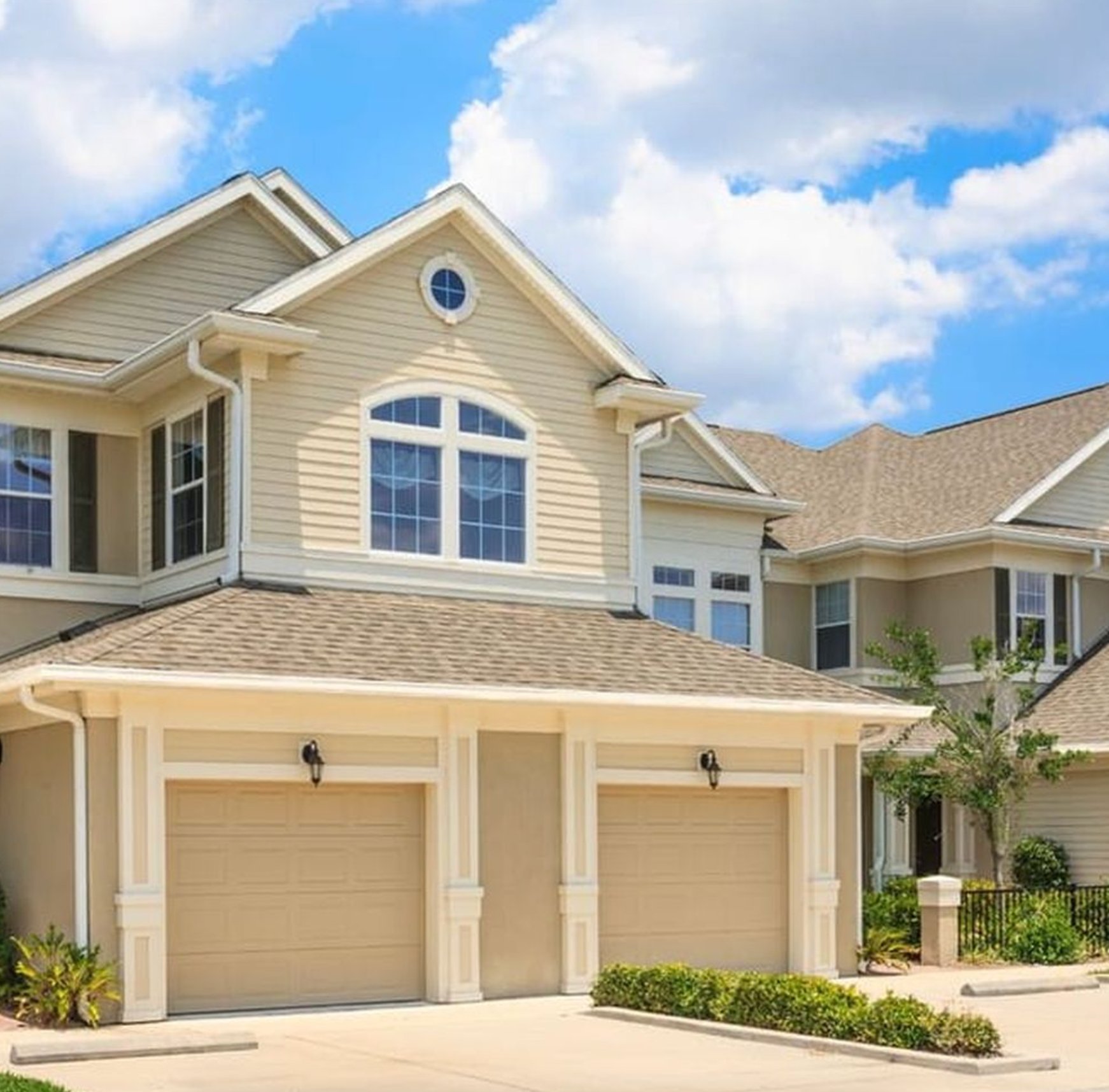 Beige house and garage