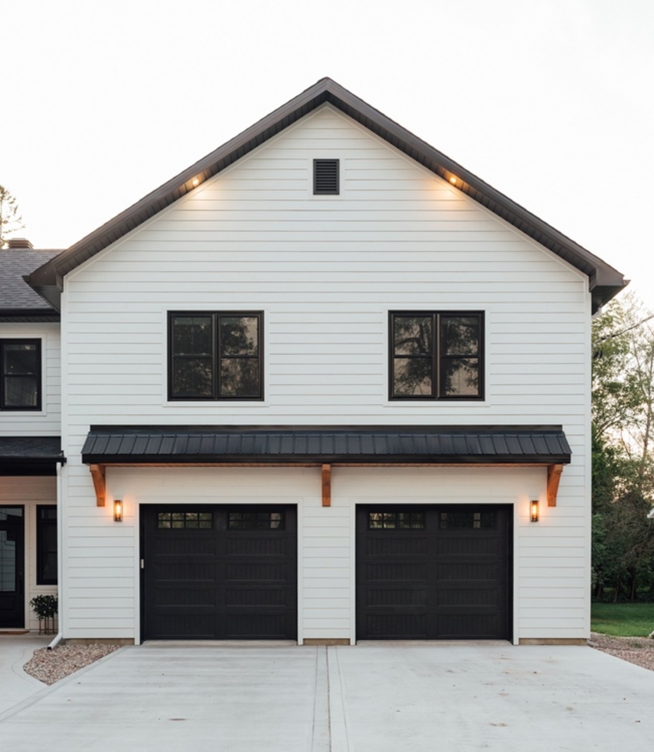Black garage and white house