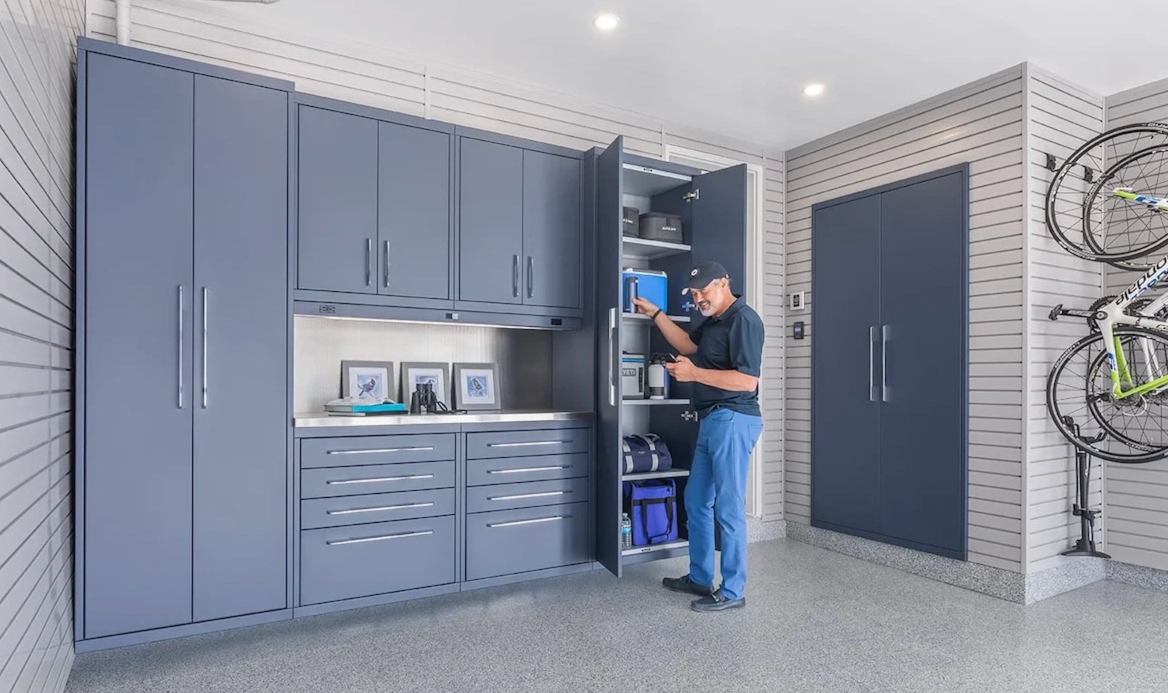 Blue cabinets and gray walls