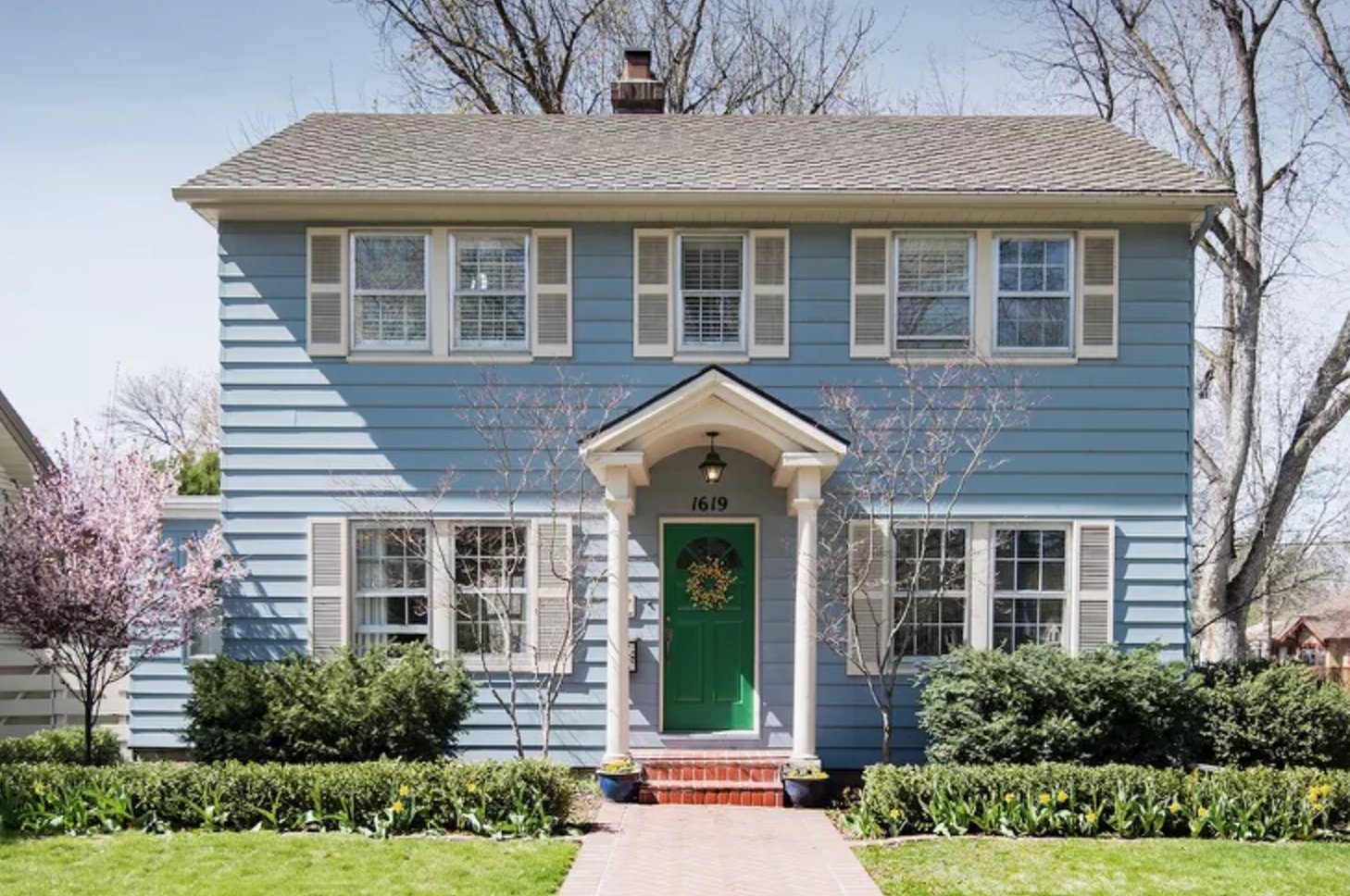 Blue white and green house exterior