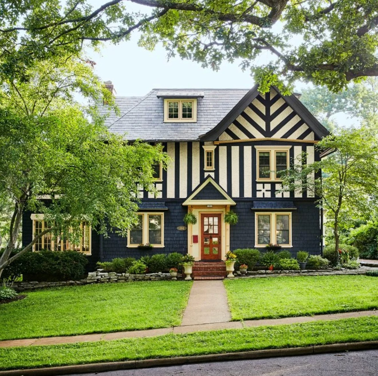 Dark blue and brown house exterior