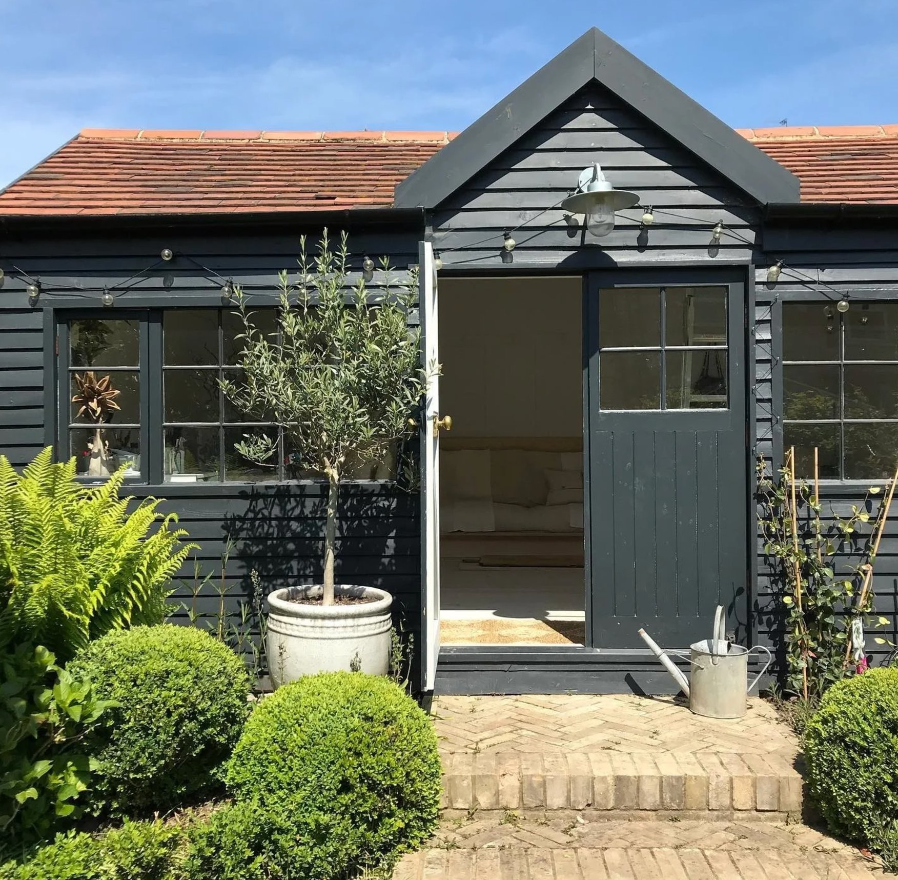 Dark green house exterior