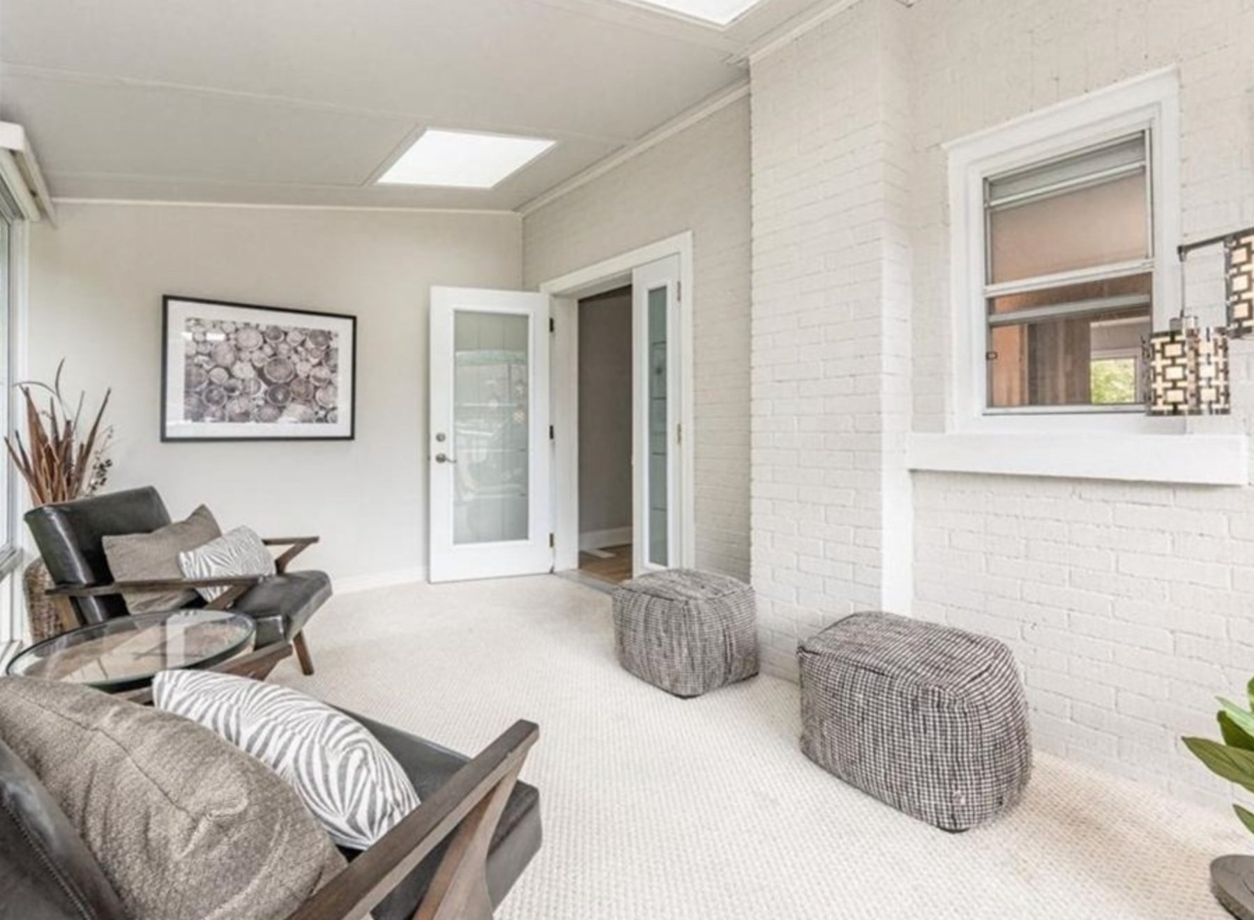 Gray flooring with off-white walls