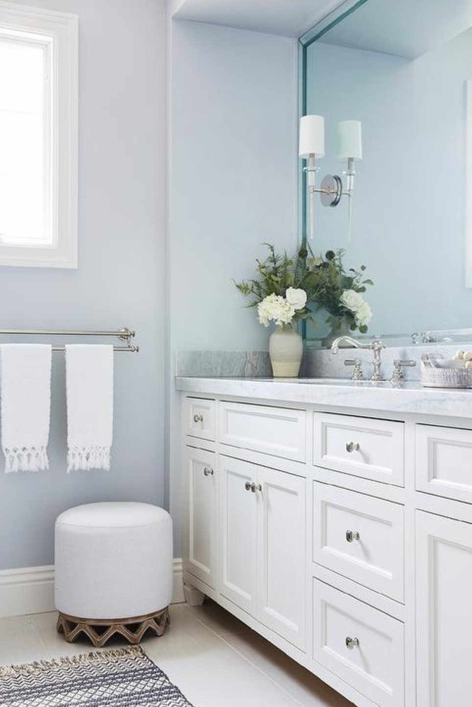 Gray flooring with pale blue walls