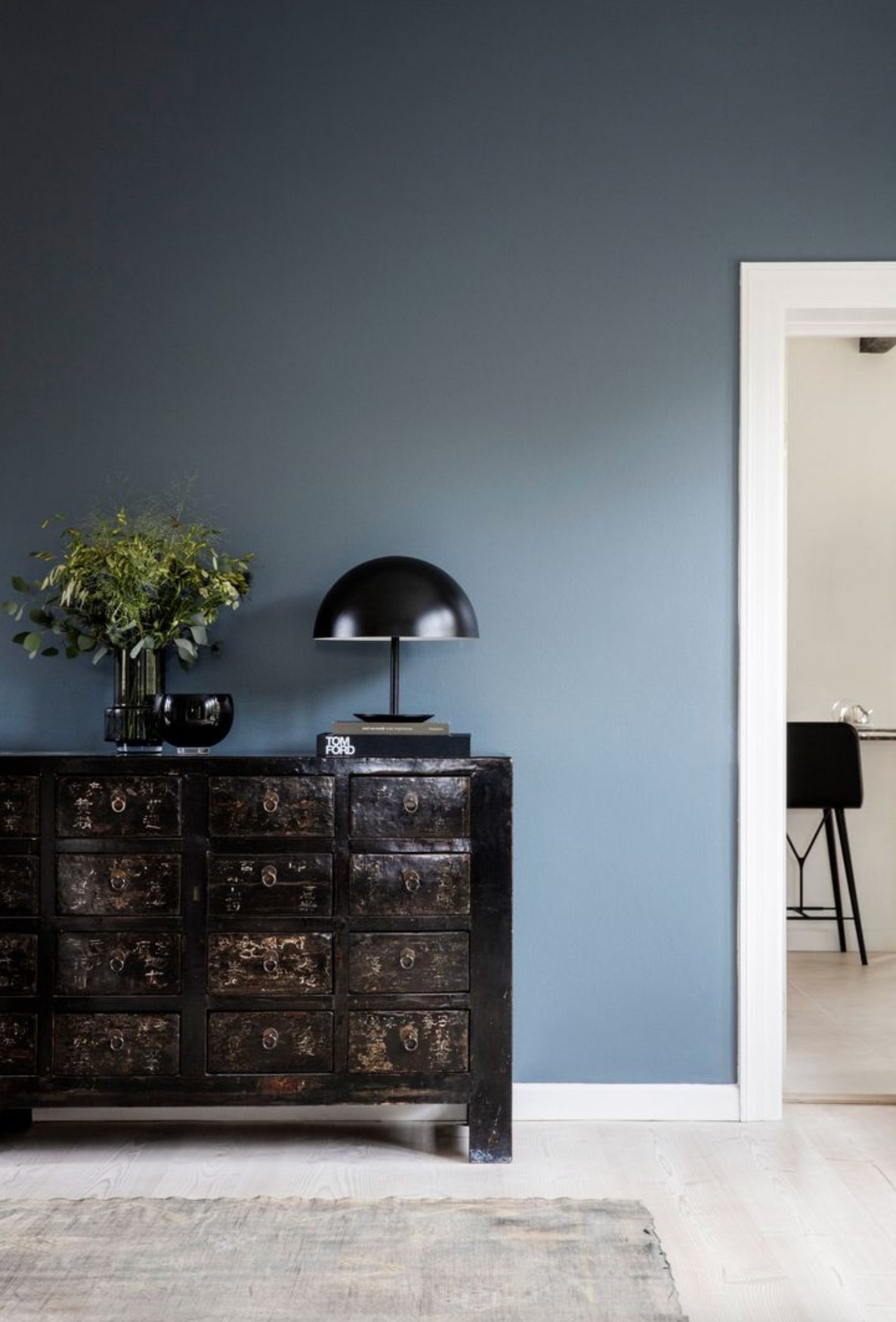 Gray flooring with slate blue walls