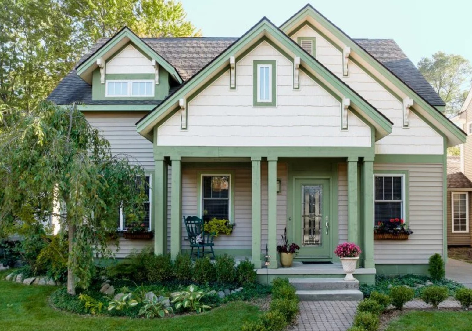 Green and white home exterior