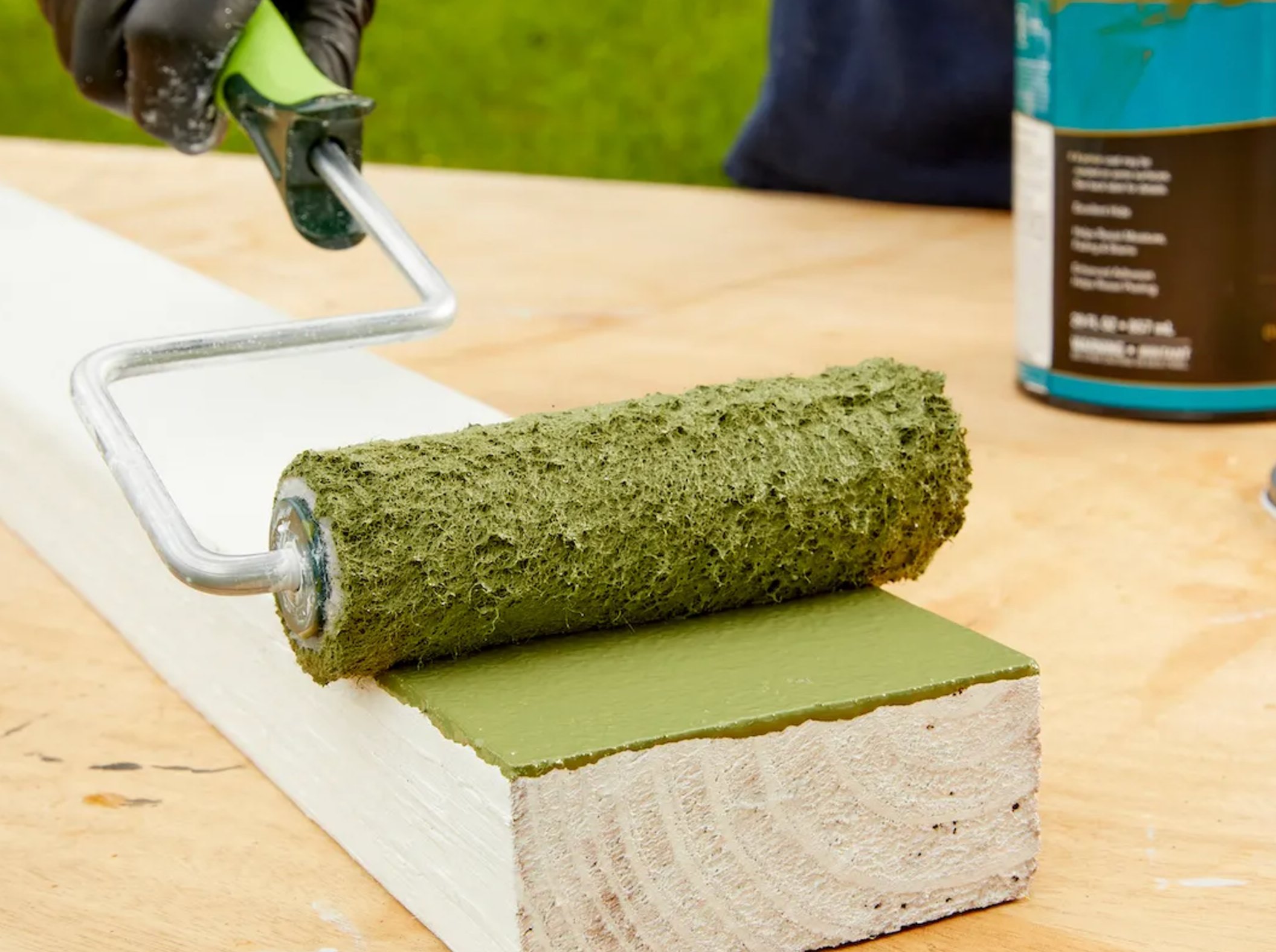 Applying primer to pressure-treated wood