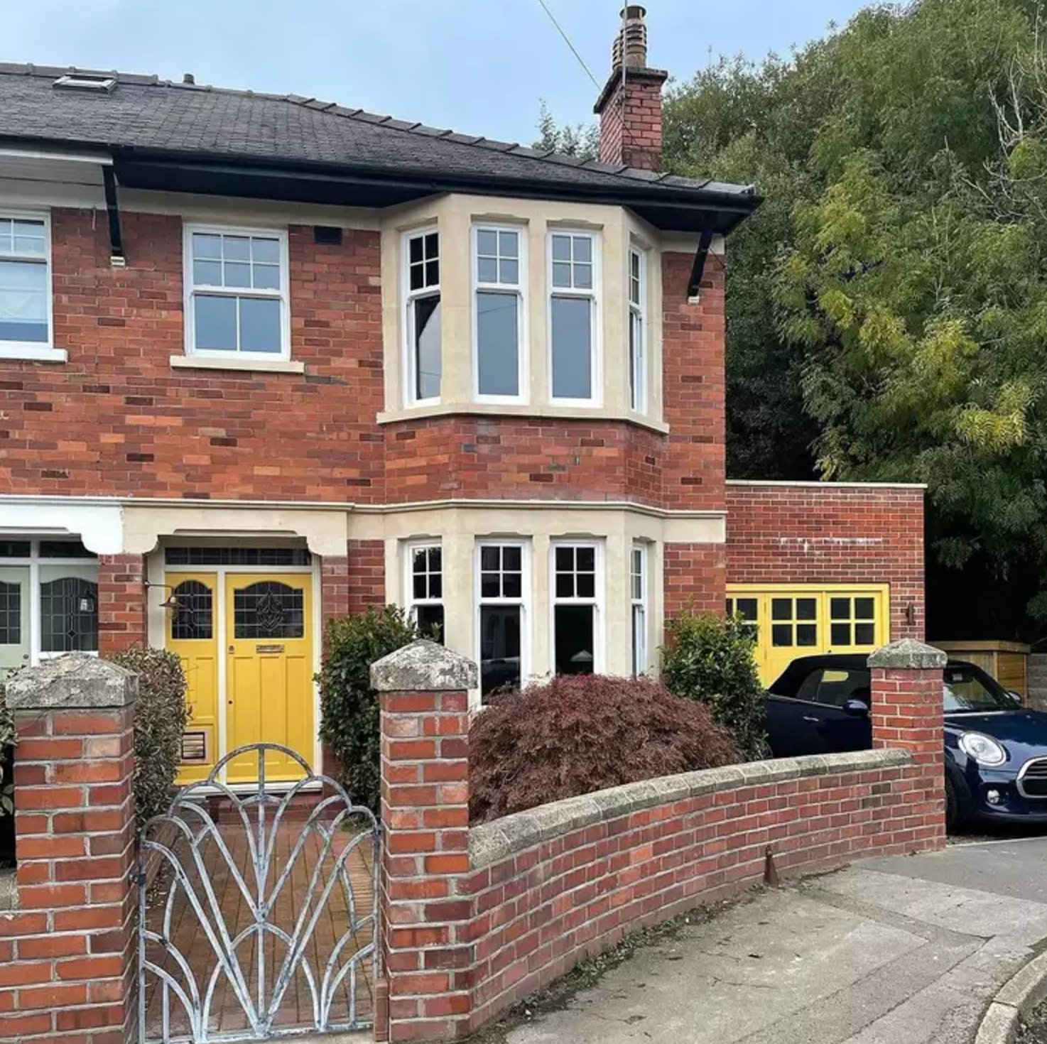 Red Brick Exterior with Yellow Accents