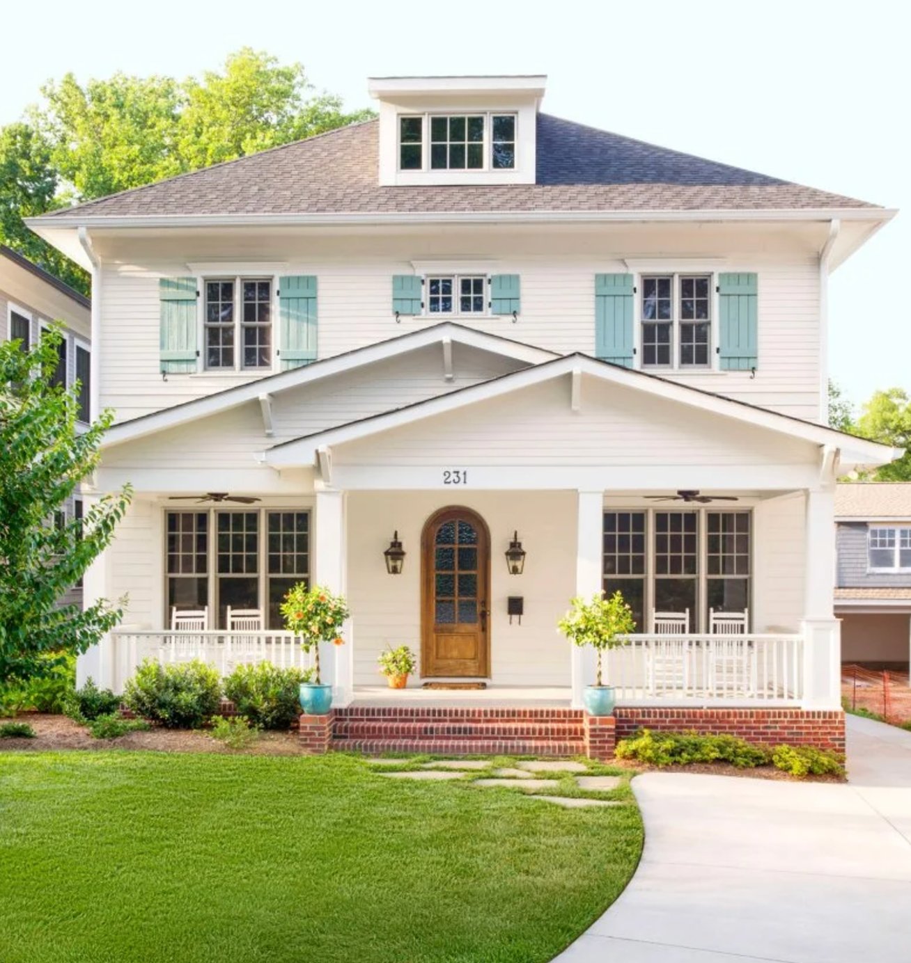 White and brown and blue house exterior